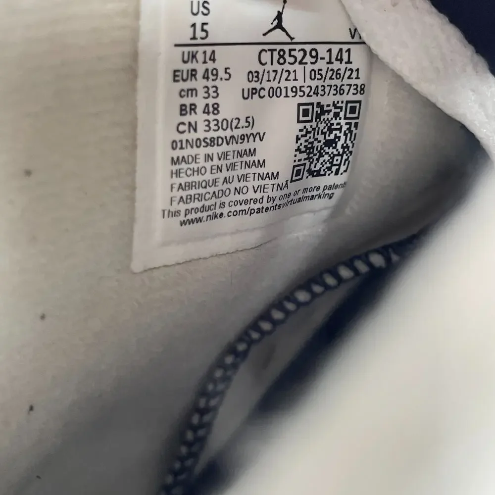 Jordan White and Navy High-Top Sneakers